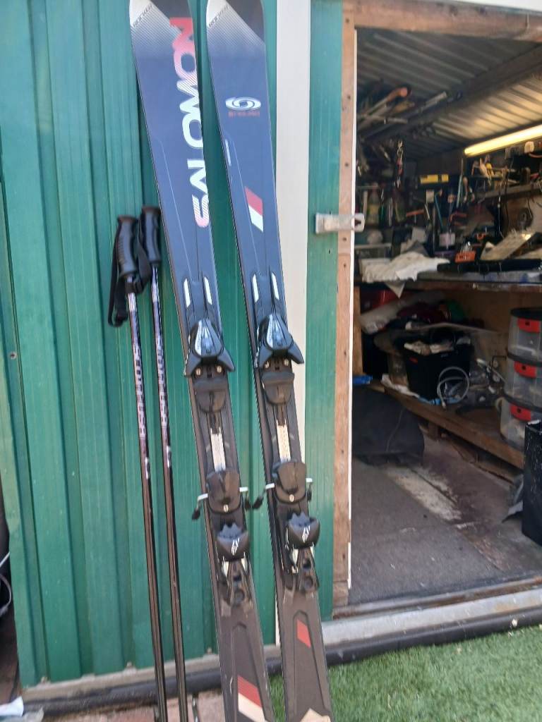 Salomon Skis with Poles – Good Condition