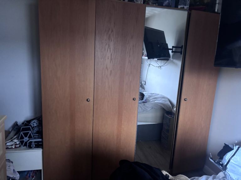 Beige Wooden 4 door wardrobe with a mirror