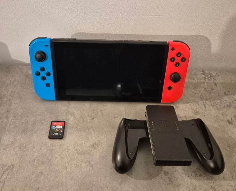 Nintendo Switch Console with Neon Joy-Cons and Rocket League
