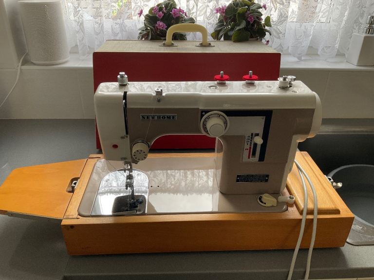 New Home Sewing Machine with Case and Manual