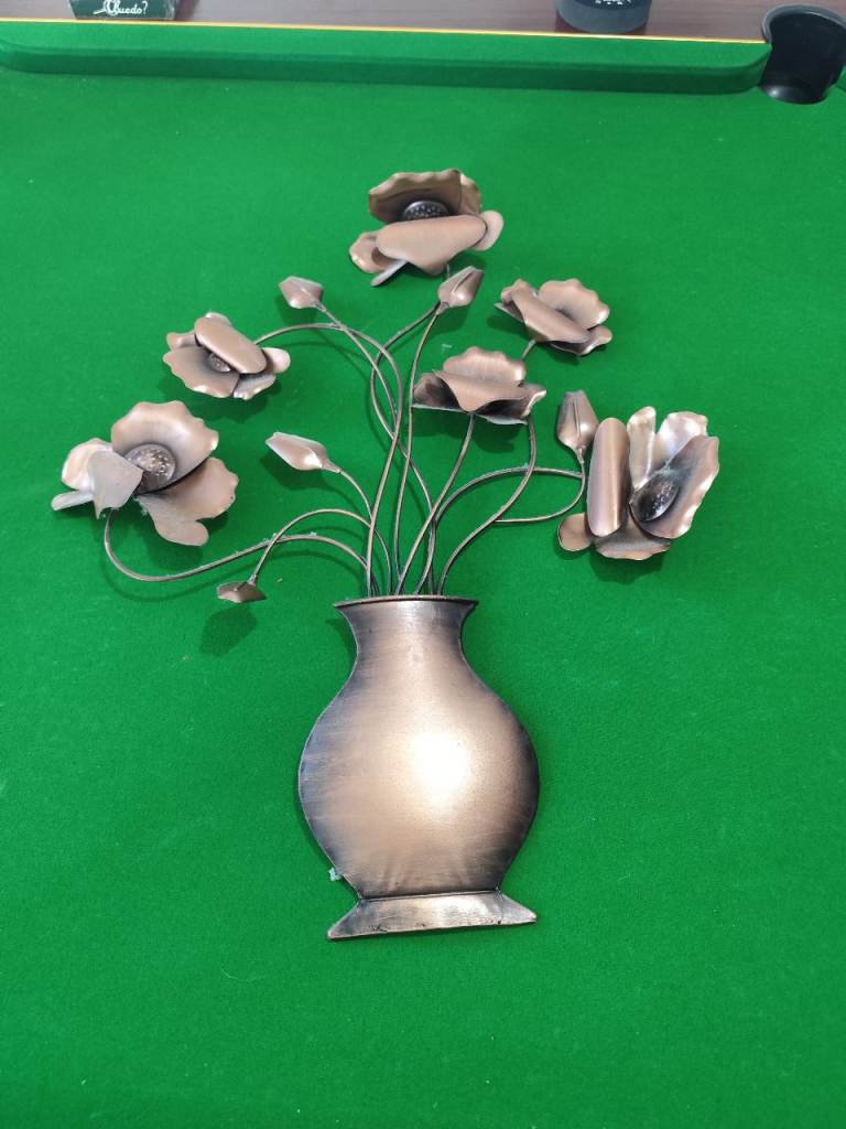 Metal flower in vase wall art 