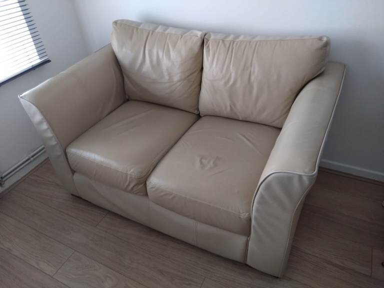 Two seater leather cream sofa