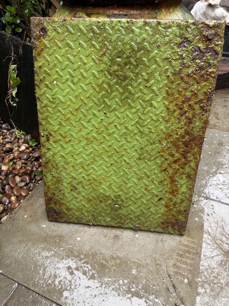 Old metal manhole cover 