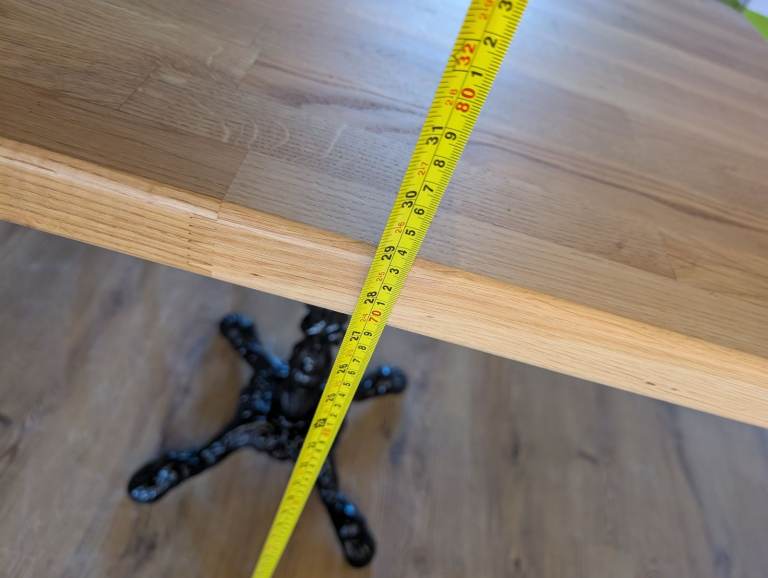 Solid Oak dinner table with cast iron base