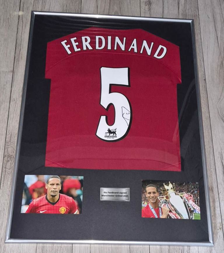 Signed football shirt. Rio Ferdinand signed Manchester United shirt in frame with proof and COA 