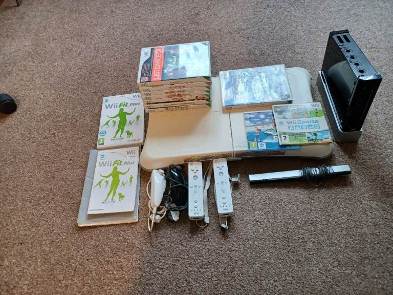 Wii plus games, accessoties  wi fit board and all cables etc