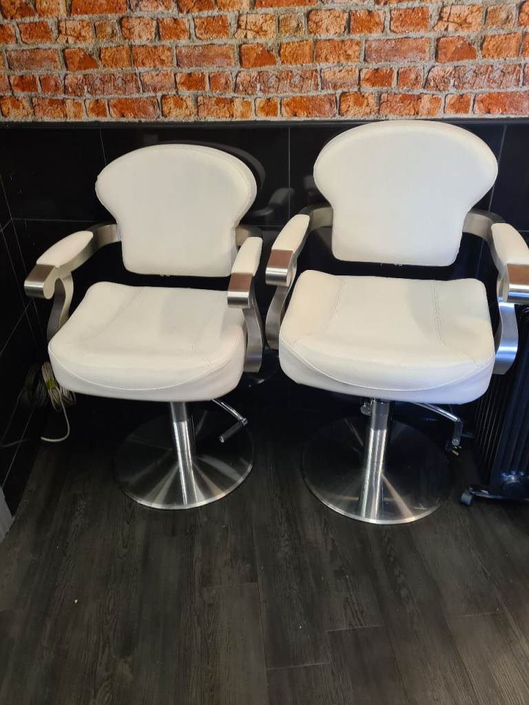 Pair of White Swivel Office Chairs – Good Condition