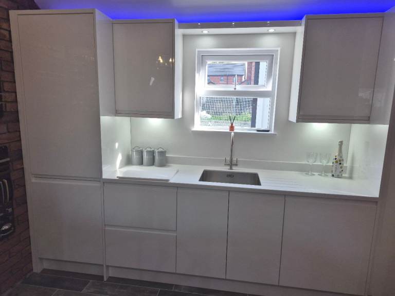 Modern White Kitchen Units with Integrated Fridge-Freezer
