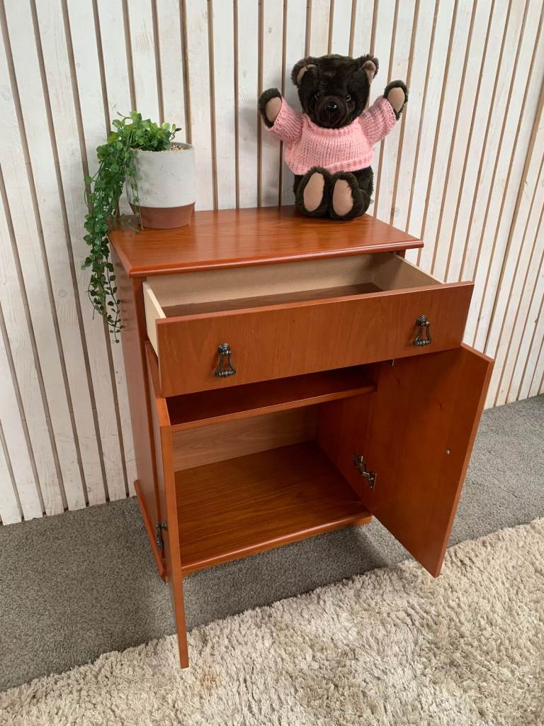 Cupboard with 1 Drawer and 2 Doors Brown wood .