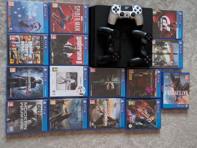 PS4 slim with 3 controllers and 15 games 