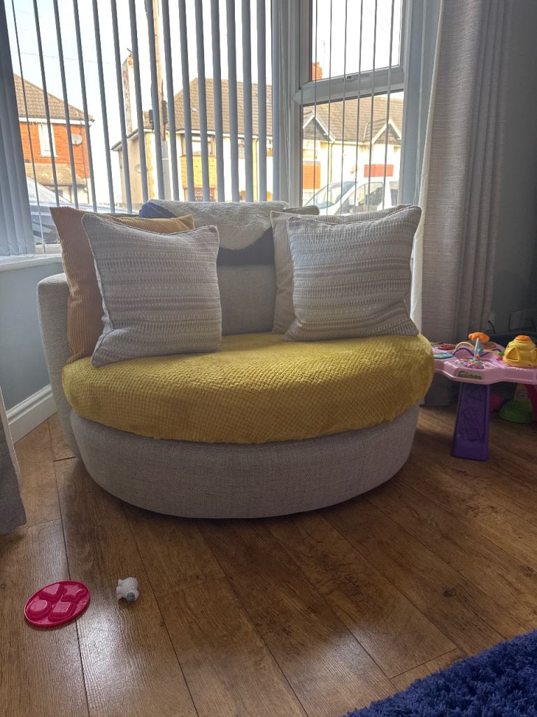 DFS cuddle spinning chair