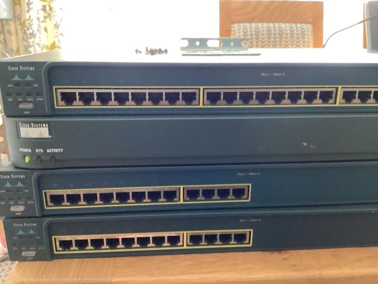 CCNA lab equip. 3 x Catalyst Cisco 2500 series switches, a 2600 series router.