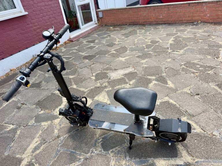 Electric Scooter with Seat – Good Condition