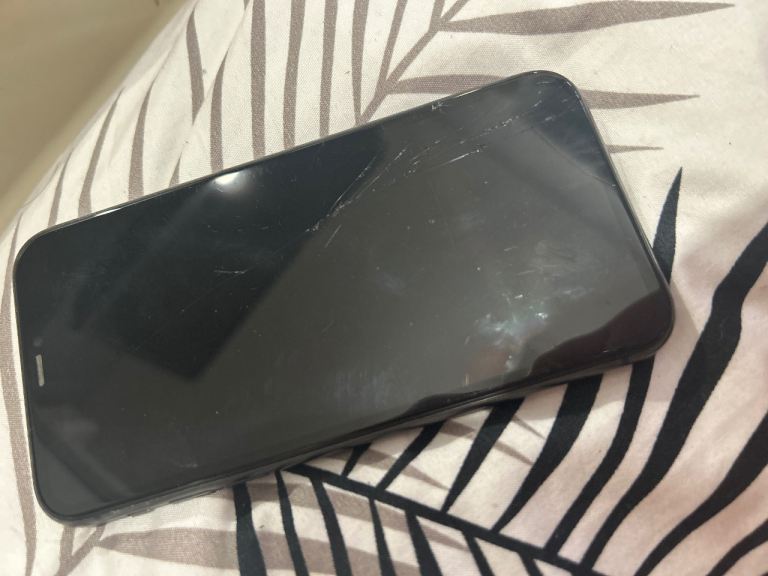 iPhone with Cracked Screen – Fully Functional