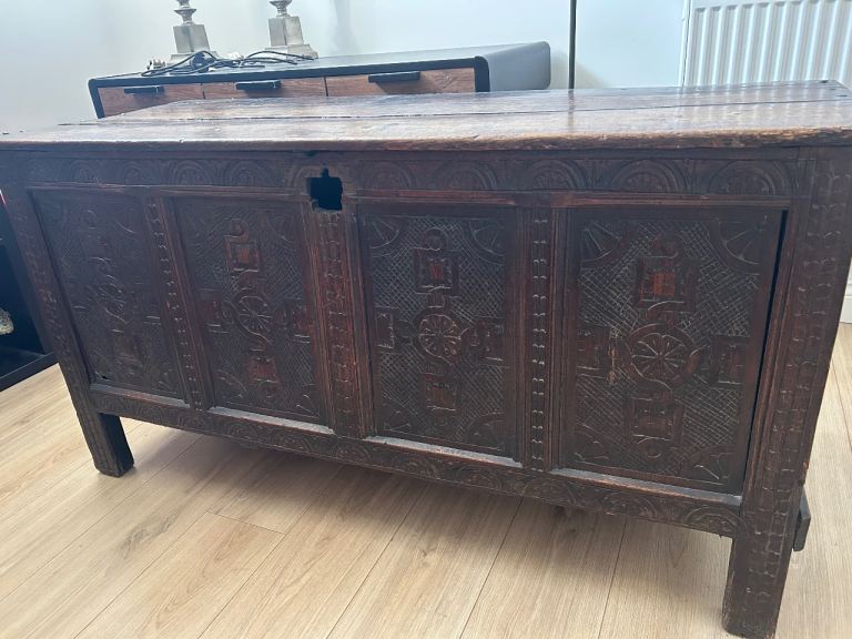 Antique carved wooden coffer