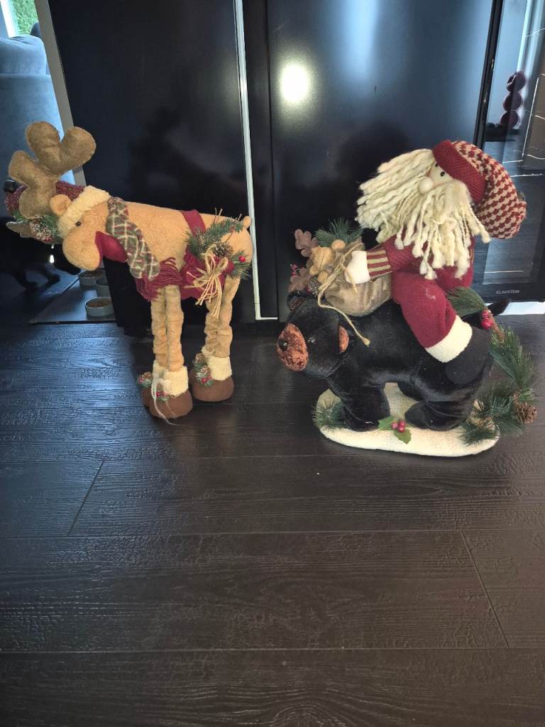 Father Christmas and reindeer Christmas decorations 