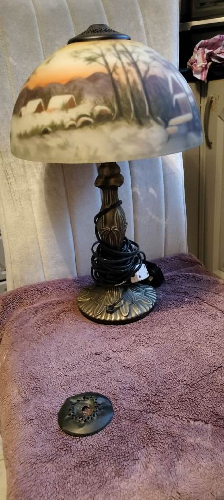 Table lamp with reverse painted glass shade 