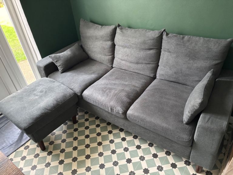 Grey sofa with stool 