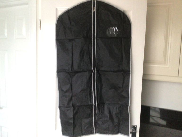 New Garment Cover with Zip opening Black with Silver Trim pleases see ad for Sizes 