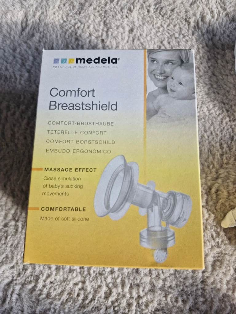 Medela breastfeeding accessories and 3 nursing bras