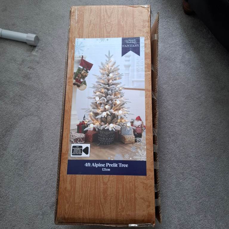 Prelit xmas tree and decorations