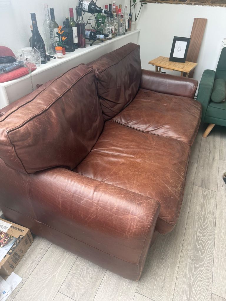 Comfortable Two-Seater Brown Leather Sofa