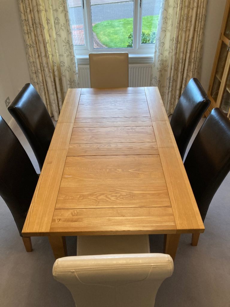 image for Dining table and chairs