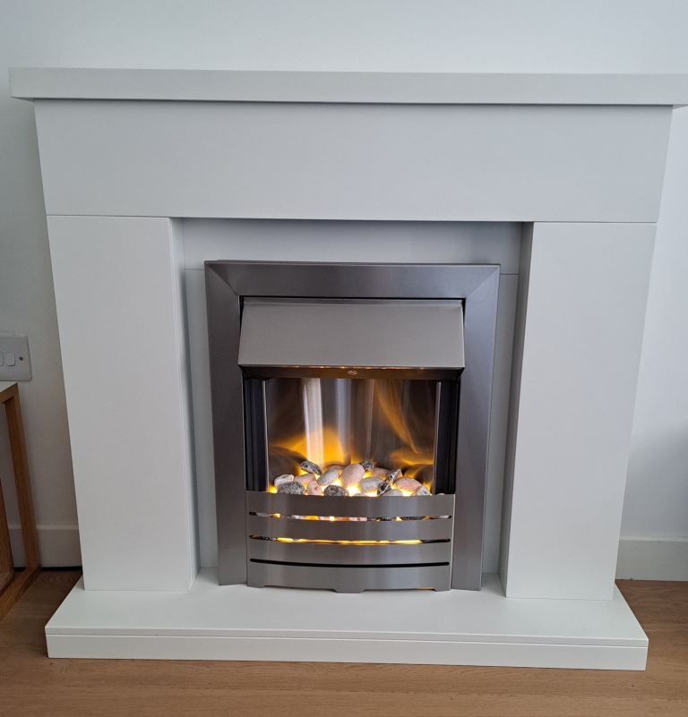 Electric fire with white surround