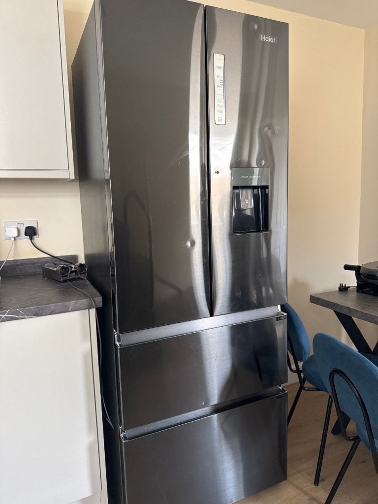 Haier American Style Fridge Freezer with Water Dispenser – Good Condition