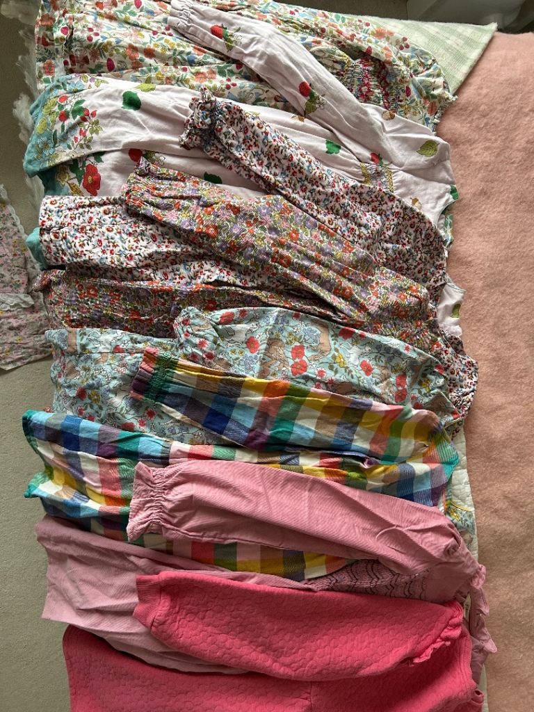 Bundle of Boden girls summer and winter dresses, H&M skirts and fur gilets