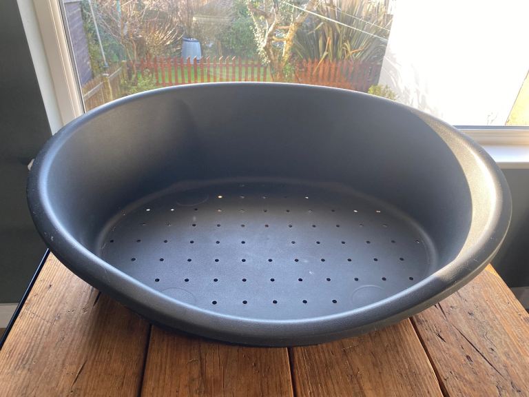 Plastic moulded dog bed