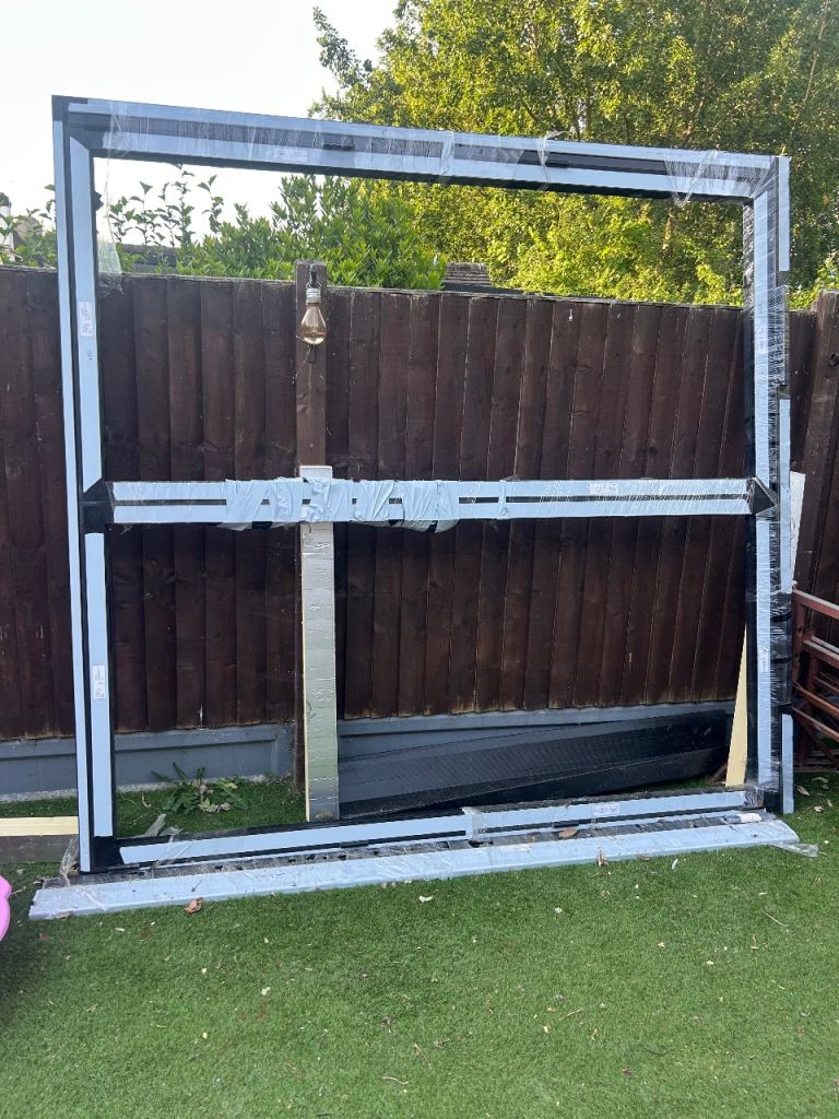 Two pane Bi-fold door in black - new!!