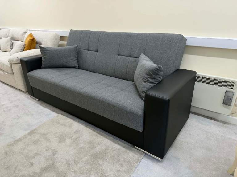 Sofa bed grey and black leather brand new little scratches available delivery