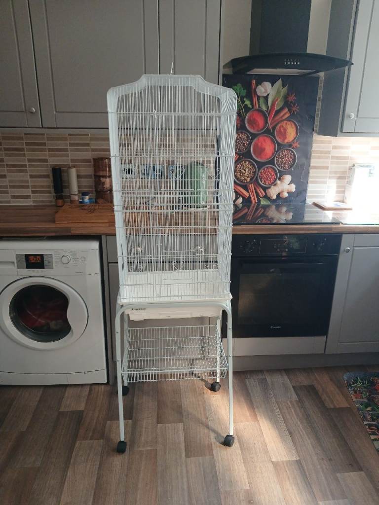 White bird cage with stand too perches and feed pots 2 