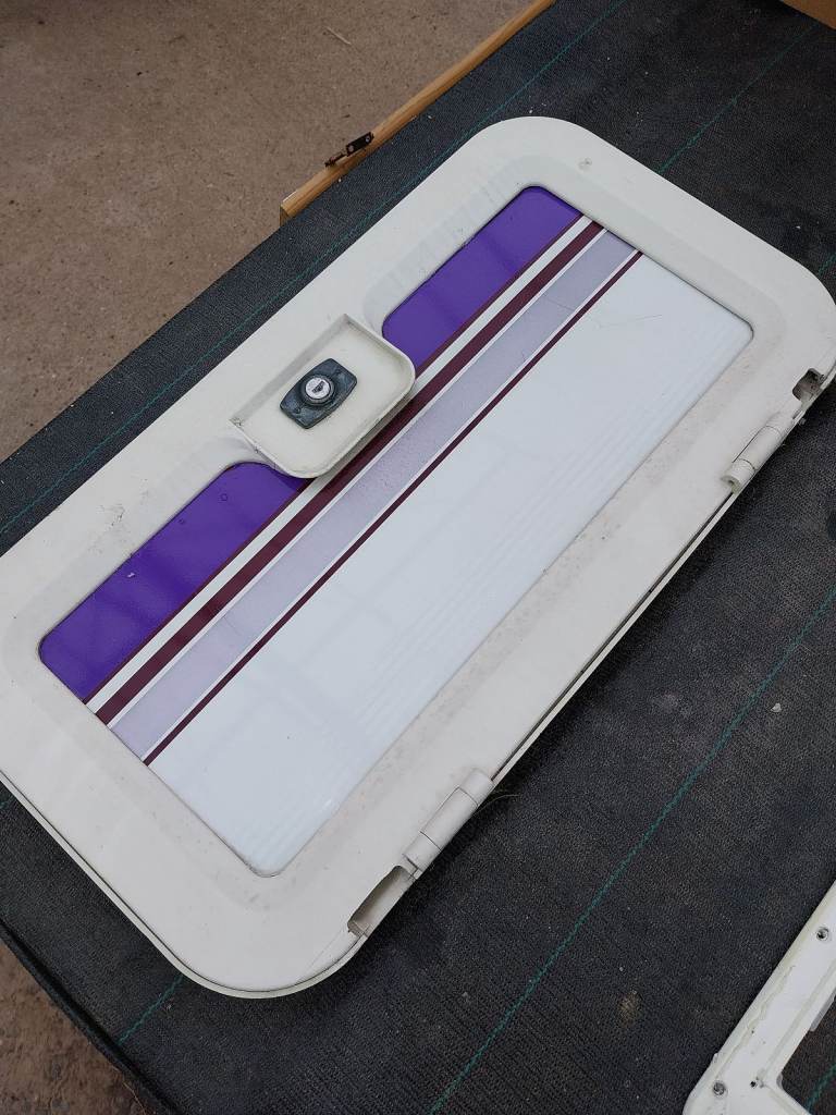 Caravan battery locker door 