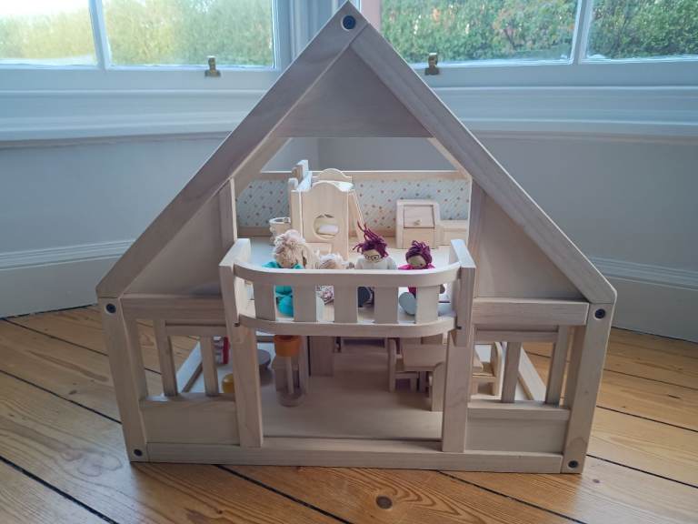 Plan toys wooden dolls house complete with furniture set and dolls, like new condition £115 ono