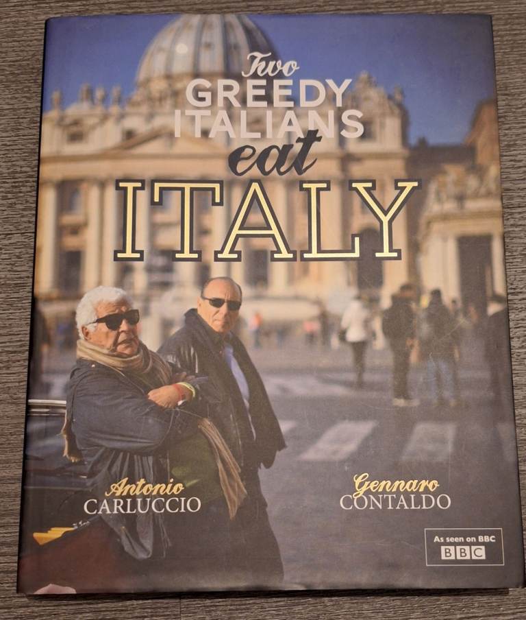Two Greedy Italians eat Italy cookbook.