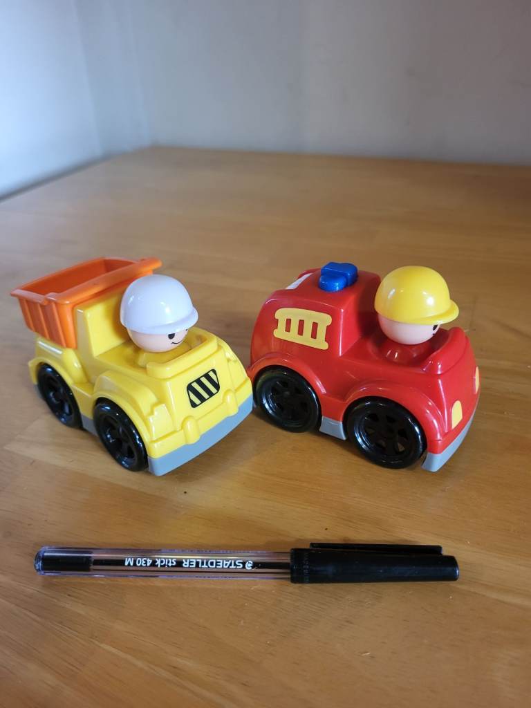 2 small kids toy cars/vehicles. Construction/dump truck & fire truck. Good condition.