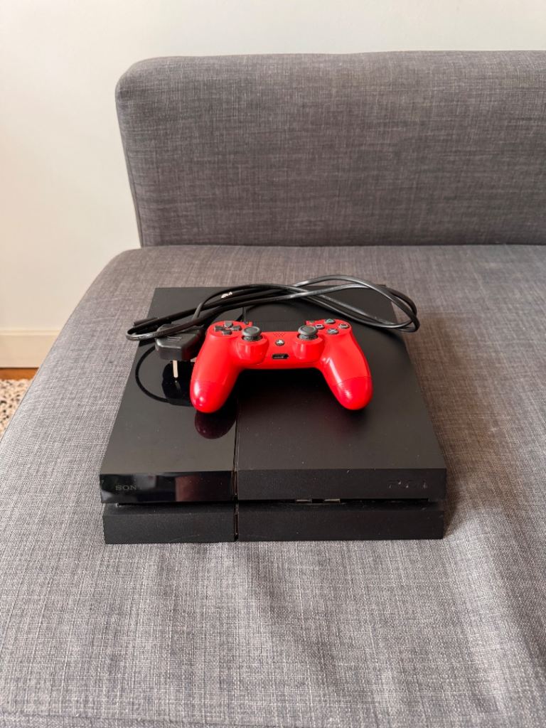 Sony PlayStation 4 Console with Red Controller – Good Condition