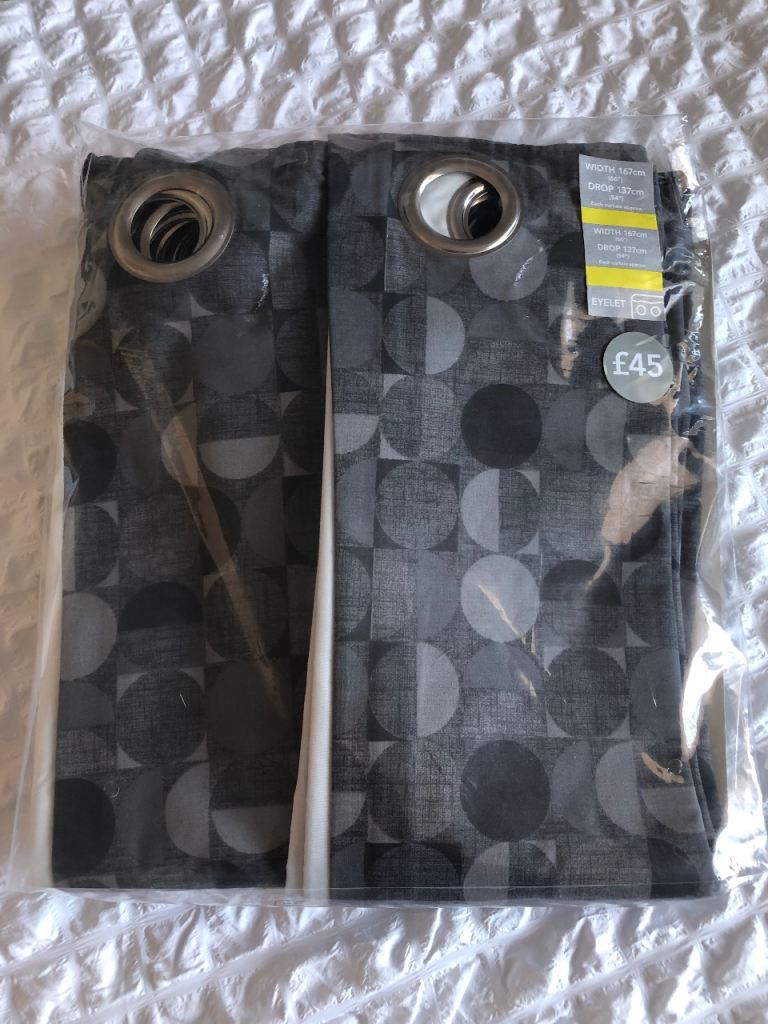 New in packaging geometric print eyelet curtains from smoke and pet free home 