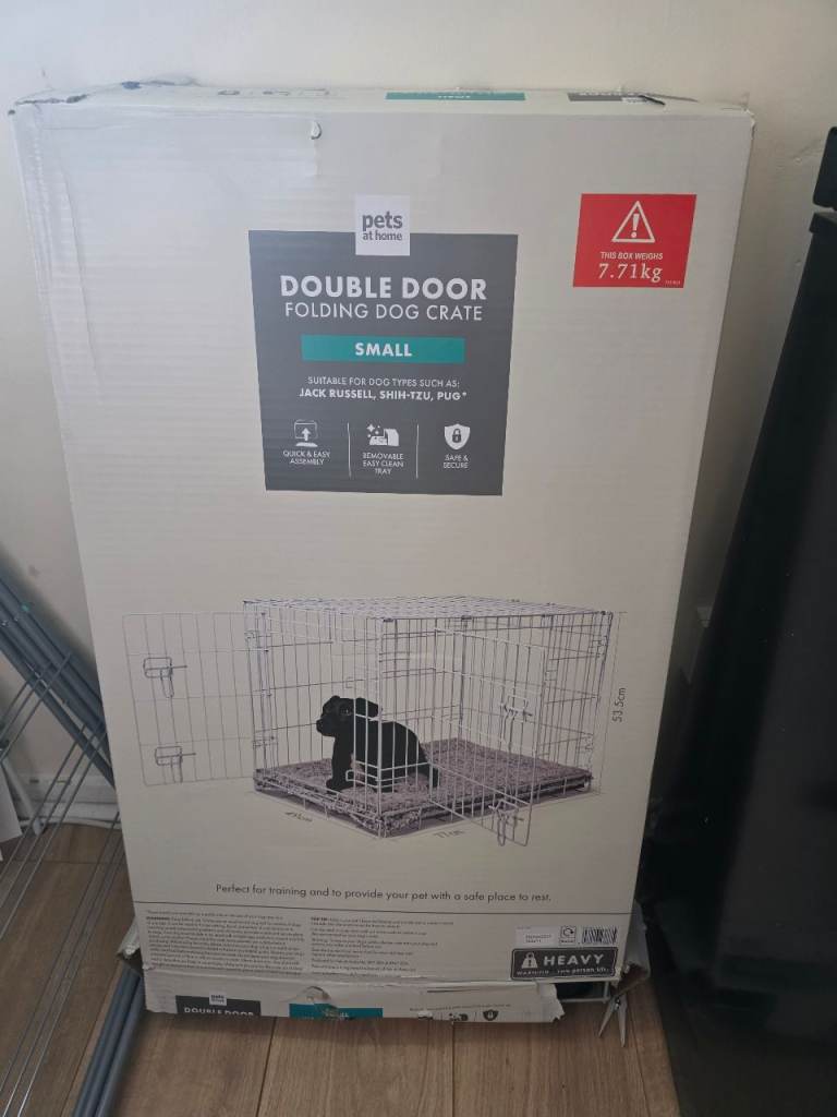 BRAND NEW white small dog crate 