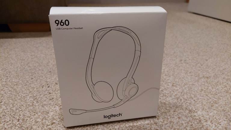 Computer monitor, headset, keyboard and mouse