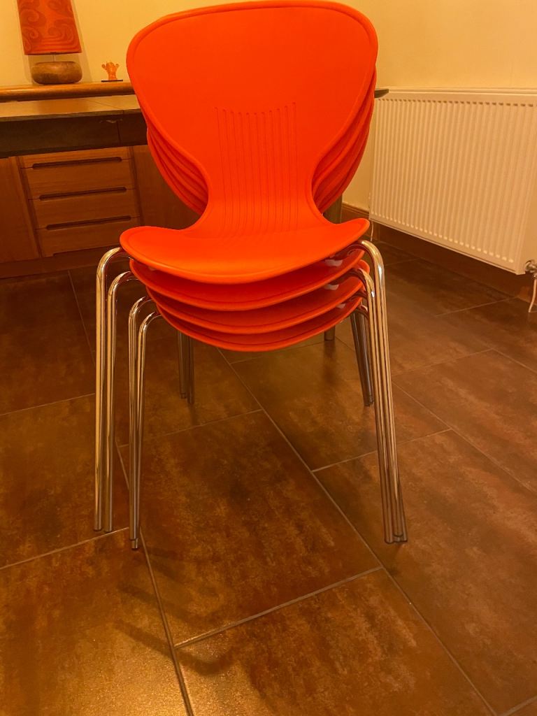4 Bistro style stackable chairs 