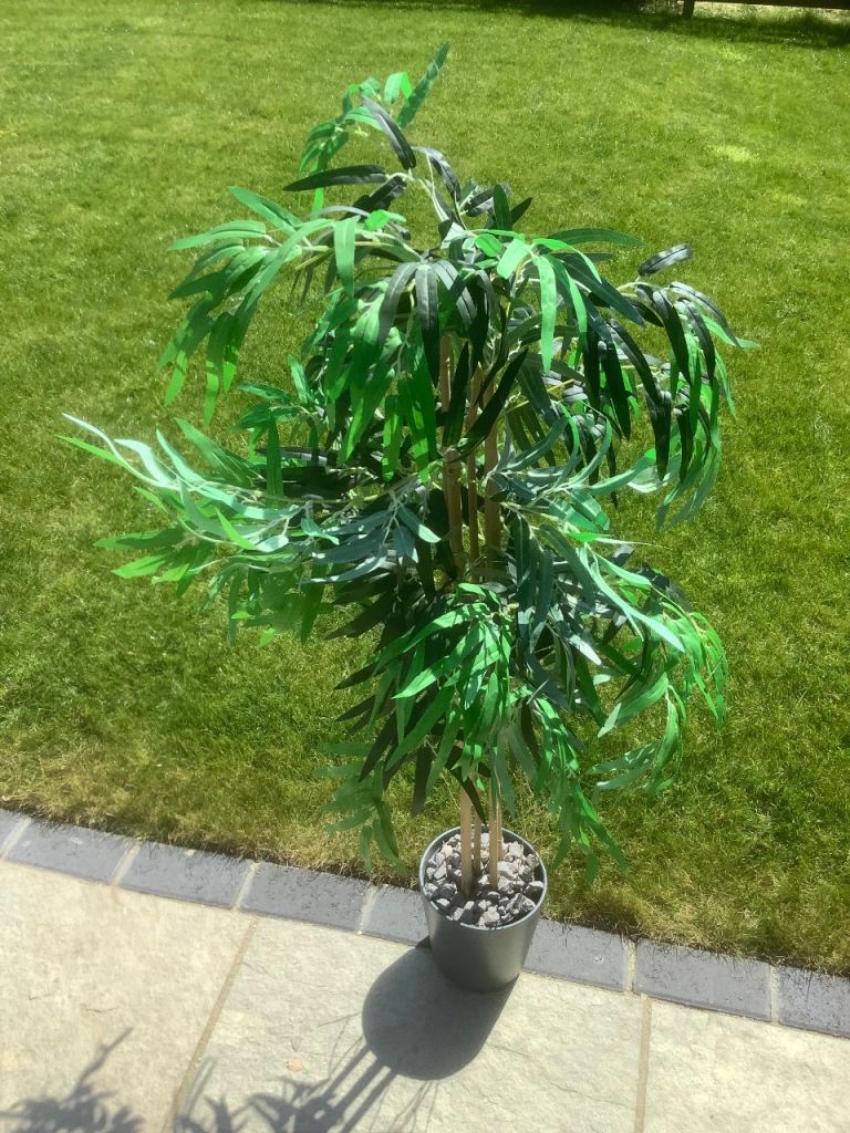 Artificial bamboo plant and decorative pot