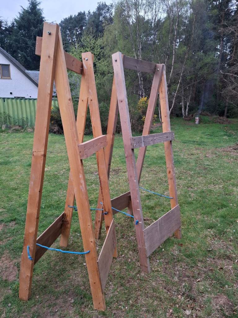 Wooden trestles approximately 2400mm tall