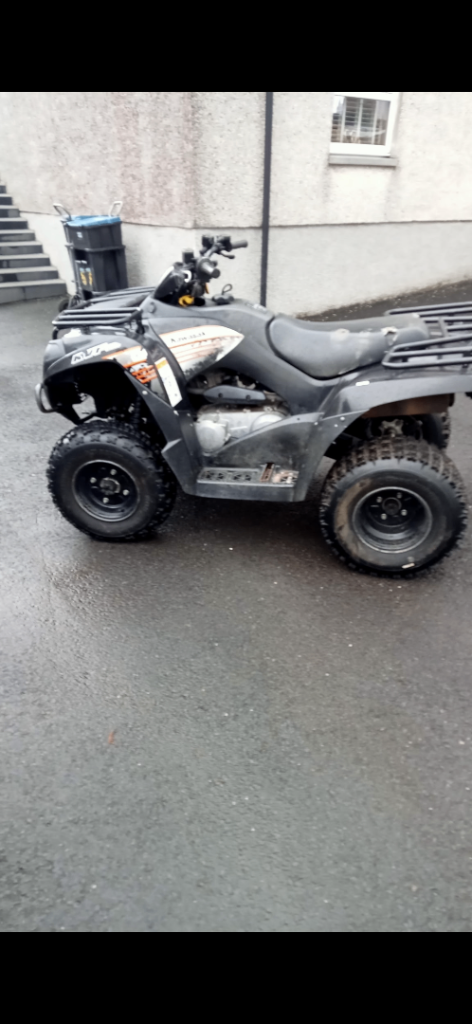 Kawasaki KVF 300cc and farm trailer 