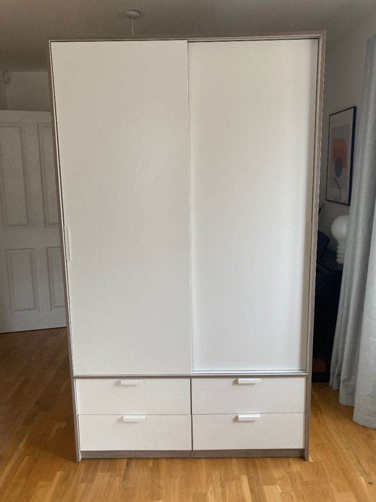 iKEA TRYSIL wardrobe  I have a used wardrobe with sliding doors, 4 drawers.