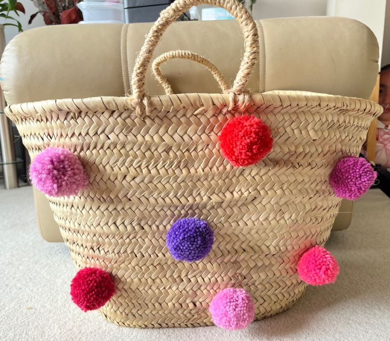 Hand decorated pompom seagrass bag 