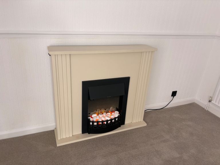 Electric Fireplace with Cream Surround and Pebbles