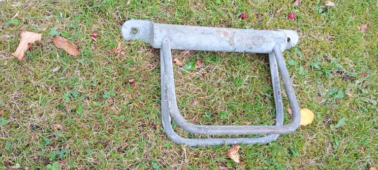 Galvanized wall mounted bicycle stands.